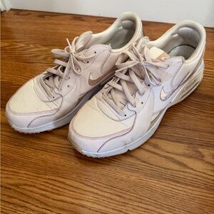 Nike Women's Pale Pink Sneakers with Metallic Swoosh